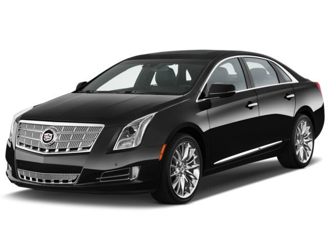 Black Cadillac XTS, front three-quarter view
