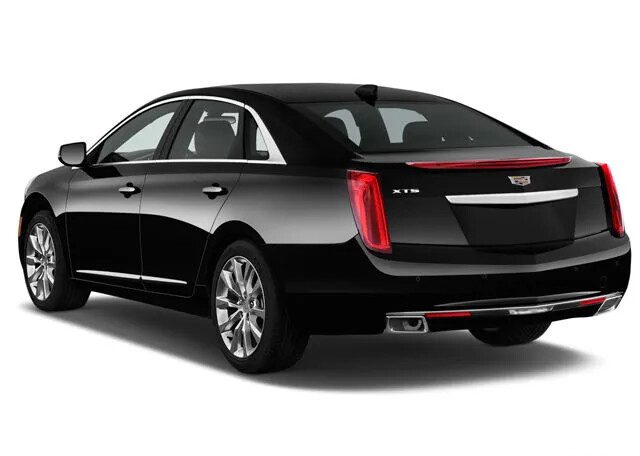 Black Cadillac XTS, rear three-quarter view