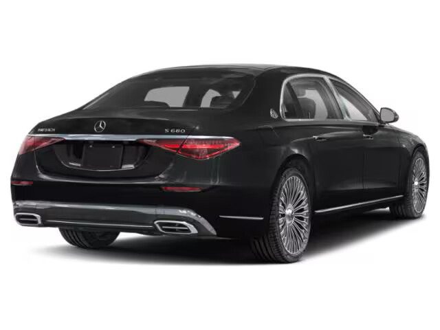 Black Mercedes-Benz S-Class, rear three-quarter view